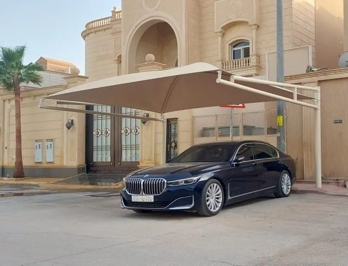 تركيب مظلات مقص ومظلات مداخل لمنازل في غرب الرياض